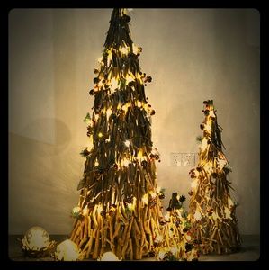 Handmade wooden Christmas tree with lamp sitting